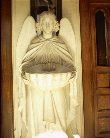 angel at the entrance of St. Peter & Paul
where Howard Hart attended Mass every day. photo by T. Walden